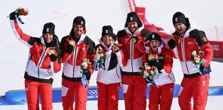 Pechino 2022, Austria vince gara a squadre di sci. Azzurri fuori ai quarti