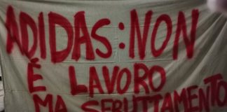 Striscioni contro il polo logistico di Adidas a Mantova