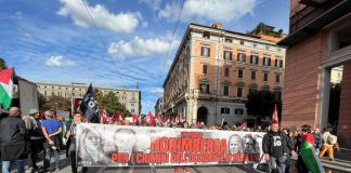 Corteo pro-Palestina a Roma. Striscione con Meloni, Netanyahu e Biden: “Serve nuova Norimberga”