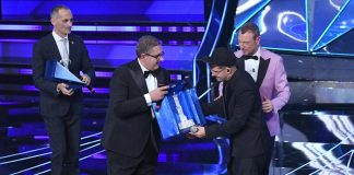 Geolier e i fischi a Sanremo, la difesa della coach: “Ha una voce da baritono incredibile”