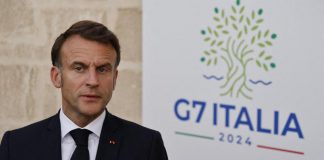 G7, gelo Meloni-Macron alla cena: lui fa il baciamano