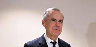 Mark Carney diventa l’idolo degli anti-Trump a Davos (e Lutnick riceve fischi)