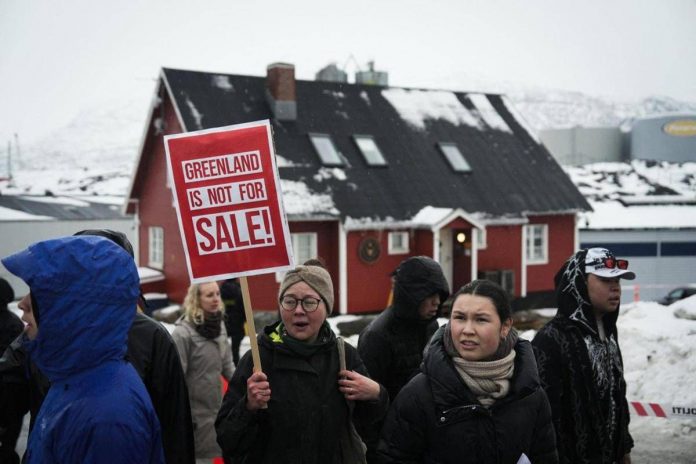 groenlandia_proteste_cartello_afp