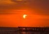 Eclissi parziale di sole, lo spettacolo al tramonto nei cieli d’Italia