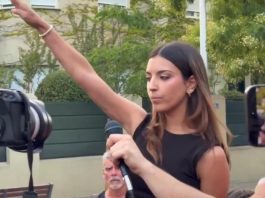 Saluto nazista davanti all’ambasciata del Marocco a Madrid, chi è l’attivista 24enne virale sui social